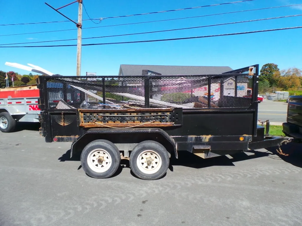 2009 Forest River  6' X 12' Dump Trailer With Mesh Extensions And Ramps  