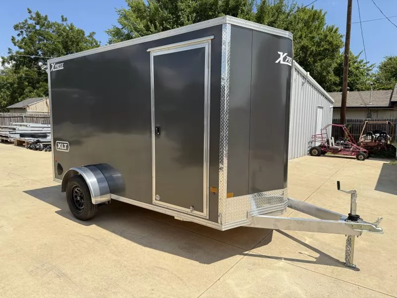 2026 New Alcom Xpress XLT 6x12 SA Aluminum Screwless Enclosed Trailer | 6'7" Interior | 4-Year Nationwide Warranty!