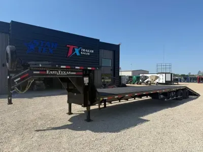 East Texas Trailers 102" X 40' GOOSENECK FLAT BED 30K WITH 12' HYDRAULIC DOVE TAIL