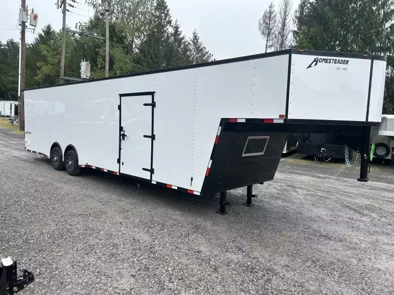 2026 Homesteader 38ft Gooseneck CHAMPION 7' tall  7ton Wide Ramp  REAR SPOILER spread axle car hauler Enclosed Cargo Trailer