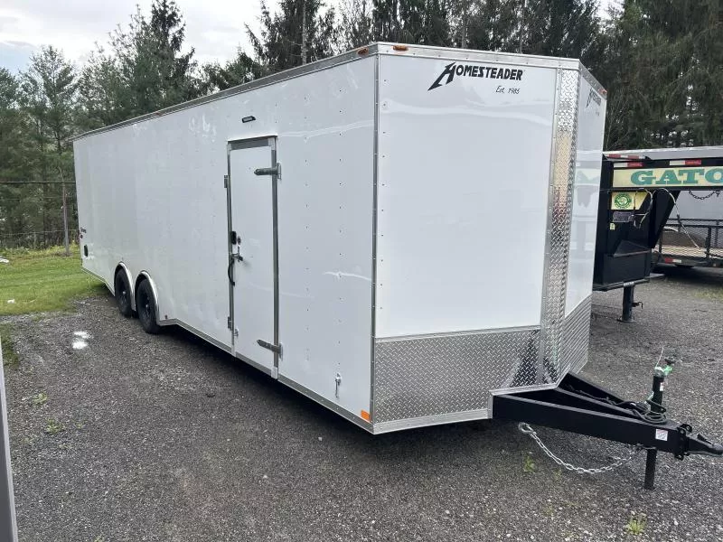 2026 Homesteader 8.5x28 Spread Axle Polycore 7ft tall Intrepid HD V-Nose 5 ton wider ramp Rear Spoiler car hauler Enclosed Cargo Trailer
