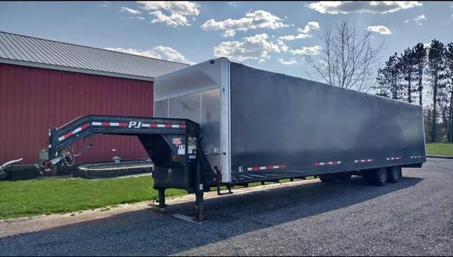 2017 PJ Trailers 40' Flatbed Trailer with Chameleon Enclosed Sliding Tarp System