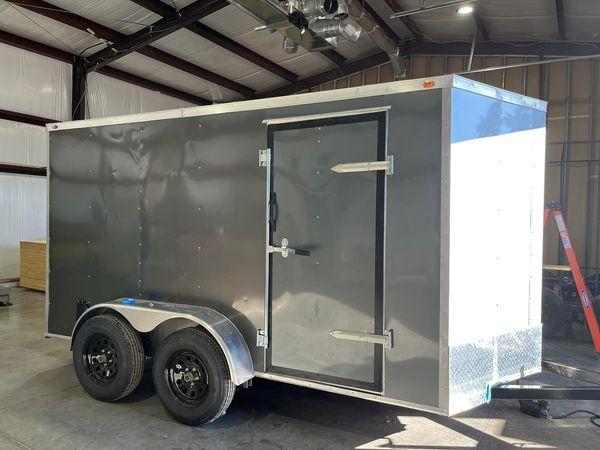 2021 Deep South 6x12 Tandem Axle Enclosed Cargo Trailer - Dent and Ding - 1 Year Warranty - Charcoal/Silver Split Metal 2021 Deep South 6x12 Tandem Axle Enclosed Cargo Trailer - Dent and Ding - 1 Year Warranty - Charcoal/Silver Split Metal