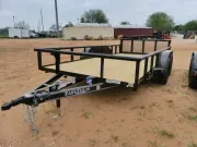 2026 East Texas Trailers | 7'X14' | Utility Pipe Top | 2-3.5k Axles | Black | Bi-fold Gate 