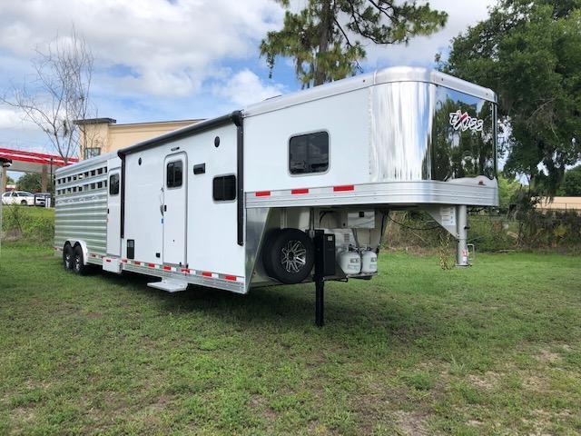 2022 Exiss Trailers 8 wide 10.6 lq w/bunk; midtack and 14' stock area Livestock Trailer 2022 Exiss Trailers 8 wide 10.6 lq w/bunk; midtack and 14' stock area Livestock Trailer