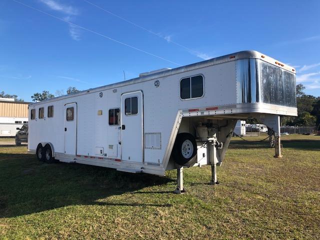 2005 Featherlite 8' wide 3 horse w/10' lq midtack and gen. Horse Trailer 2005 Featherlite 8' wide 3 horse w/10' lq midtack and gen. Horse Trailer