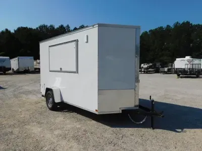2026 Covered Wagon Trailers Covered Wagon Gold Series 6x12 Vendor Trailer with Extras