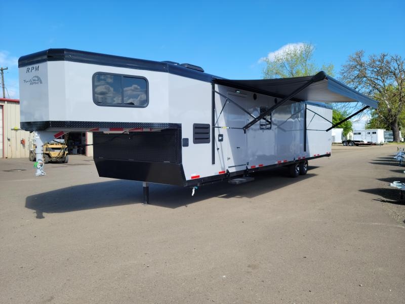 2023 Trails West 34' RPM FreeRide GN Toy Hauler Trailer - Dual Air Conditioners - Auxiliary Propane Hookup - 1000 Watt Inverter - 40 Gallon Fuel Cell Pump - Power Awning - Bunk Beds - Toilet/Shower Combo - 100w Solar System - Power Rear Ramp 2023 Trails West 34' RPM FreeRide GN Toy Hauler Trailer - Dual Air Conditioners - Auxiliary Propane Hookup - 1000 Watt Inverter - 40 Gallon Fuel Cell Pump - Power Awning - Bunk Beds - Toilet/Shower Combo - 100w Solar System - Power Rear Ramp
