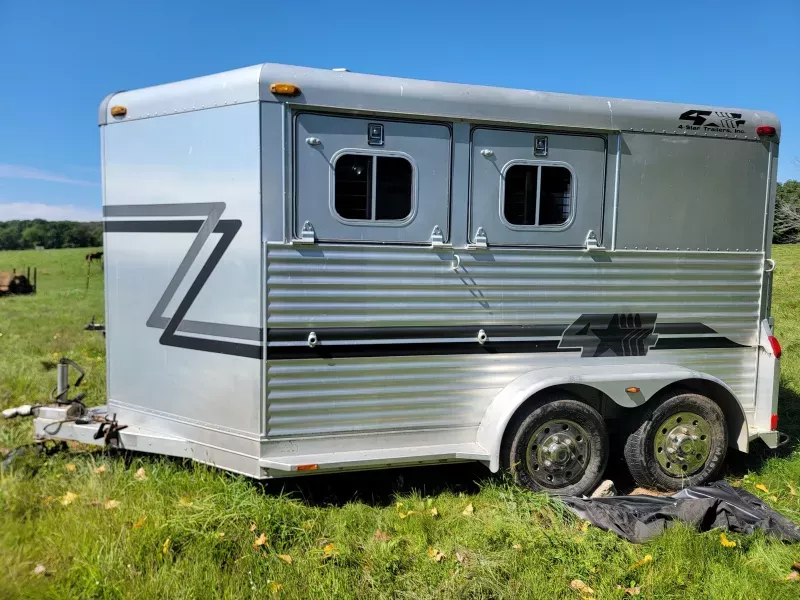 2001 4 Star 2 horse slant trailer with ramp and tack room