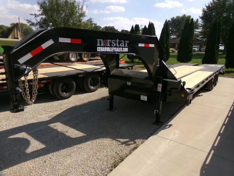 2026 Norstar 102 x 25 (20+5) FXG Deckover with 22,000lb. GVWR with One Piece Engineered Neck, Rampage Ramps and Matching Spare Deckover Trailer