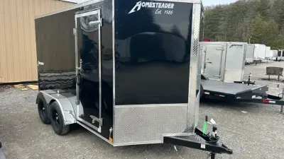 2027 Homesteader Trailers 7x12 Intrepid tandem axle sd ramp door 6'6" tall Enclosed Cargo Trailer