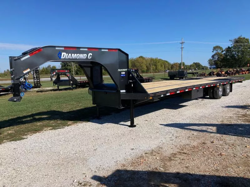 2026 Diamond C 102X35 TANDEM 25K GN HYDROTAIL W/ BLACKWOOD RUNNERS, HYDROJACKS, ALUM OUTTERS & 14 PLY TIRES