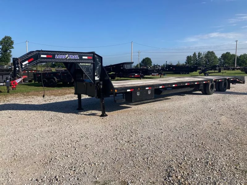 2021 Load Trail 102x40 TANDEM 25.9K GN FLATBED W/ MAX RAMPS, DUNNAGE RACK, SHOCKER HITCH & TORQUE TUBE