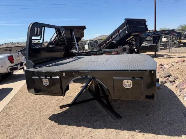 2025 Crownline (Hay Beds) Crownline SKD57 Skirted, Dual-Wheel, Long Bed, Black Boxes (8′ 6″ x 97″-57″ CTA) Flat Decks