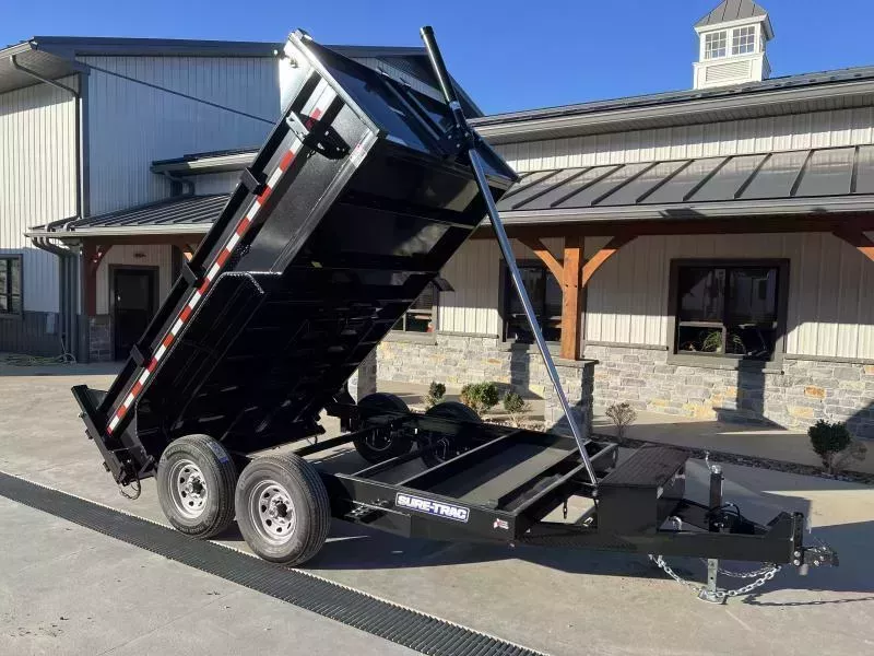 2026 Sure-Trac 7x12' Dump Trailer 12000# GVW * TARP KIT * TELESCOPIC HOIST * FRONT/REAR BULKHEAD * INTEGRATED KEYWAY * 2' SIDES * UNDERBODY TOOL TRAY * ADJUSTABLE COUPLER * 110V CHARGER * UNDERMOUNT RAMPS * COMBO GATE * 7K DROP LEG JACK * SPARE MOUNT