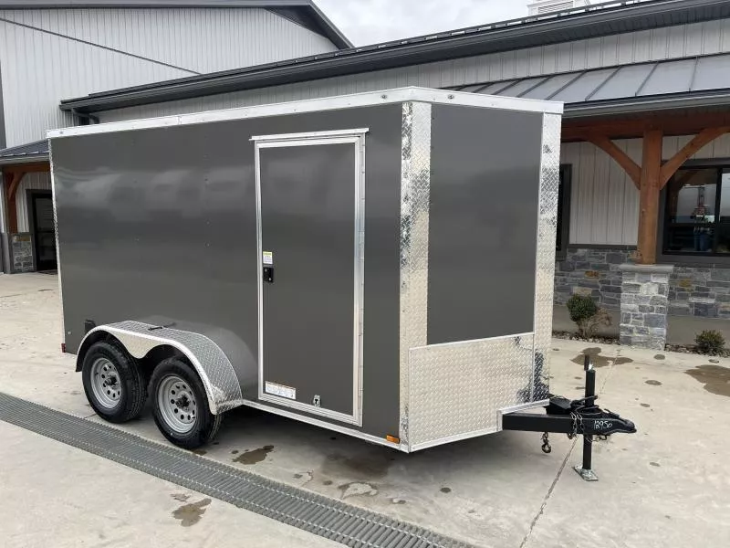 2026 Xtreme Cargo 6x12 Enclosed Cargo Trailer 7000# GVW * 6'3" HEIGHT * 16" O.C. FLOOR AND WALLS * CHARCOAL EXTERIOR * .080 POLYCOR SEMI-SCREWLESS * RV DOOR * PLYWOOD WALLS AND FLOOR * TUBE STUDS * D-RINGS