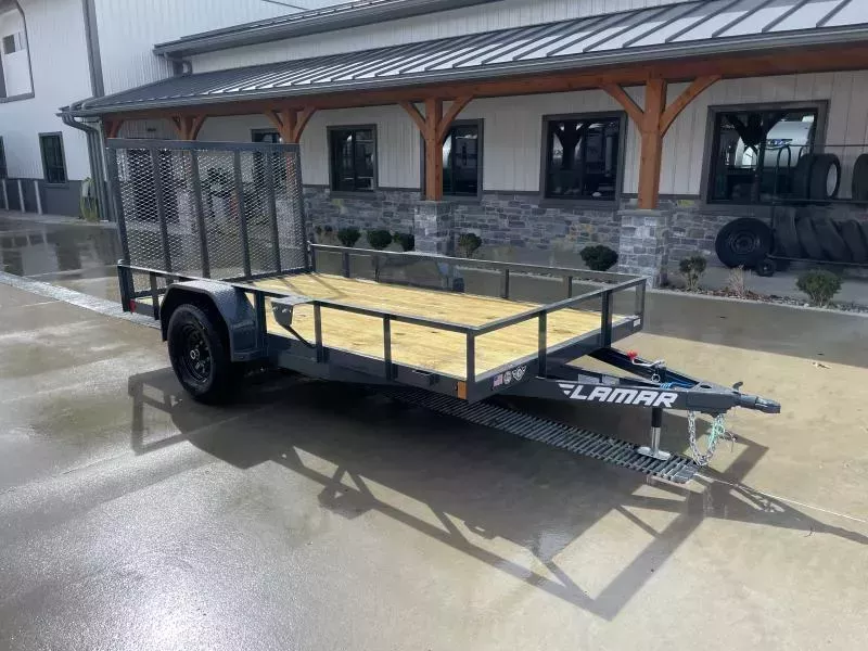 2026 Lamar 77x12' Utility Landscape Trailer 5200# GVW * 5200# AXLE * ELECTRIC BRAKES * CHANNEL FRAME * SPARE TIRE MOUNT * CAST COUPLER * SWIVEL JACK * COLD WEATHER HARNESS * STAKE POCKETS * LAY FLAT/TUBE GATE W/SPRING ASSIST * LED LIGHTS