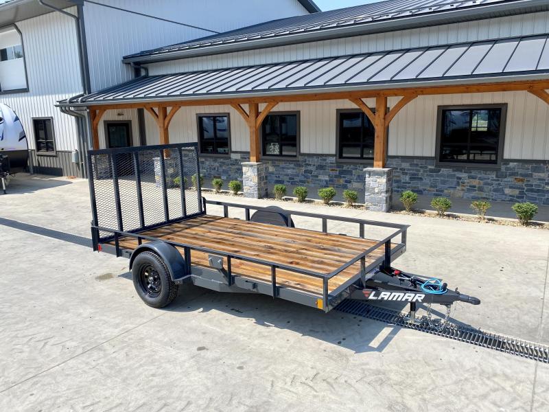 2021 Lamar 7x12' Utility Landscape Trailer 2990# GVW * CHANNEL FRAME * SPARE TIRE MOUNT * CAST COUPLER * SWIVEL JACK * COLD WEATHER HARNESS * STAKE POCKETS * LAY FLAT/TUBE GATE W/SPRING ASSIST * LED LIGHTS 2021 Lamar 7x12' Utility Landscape Trailer 2990# GVW * CHANNEL FRAME * SPARE TIRE MOUNT * CAST COUPLER * SWIVEL JACK * COLD WEATHER HARNESS * STAKE POCKETS * LAY FLAT/TUBE GATE W/SPRING ASSIST * LED LIGHTS