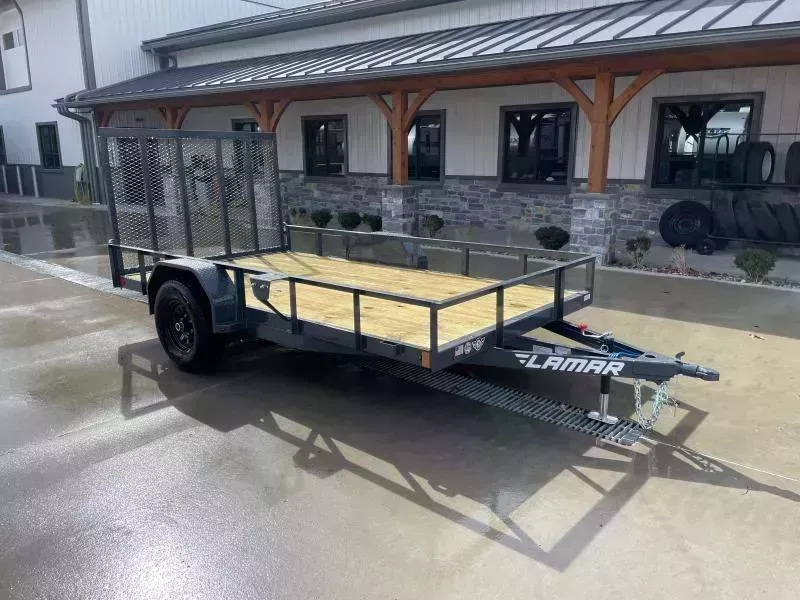 2026 Lamar 77x12' Utility Landscape Trailer 5200# GVW * 5200# AXLE * ELECTRIC BRAKES * CHANNEL FRAME * SPARE TIRE MOUNT * CAST COUPLER * SWIVEL JACK * COLD WEATHER HARNESS * STAKE POCKETS * LAY FLAT/TUBE GATE W/SPRING ASSIST * LED LIGHTS