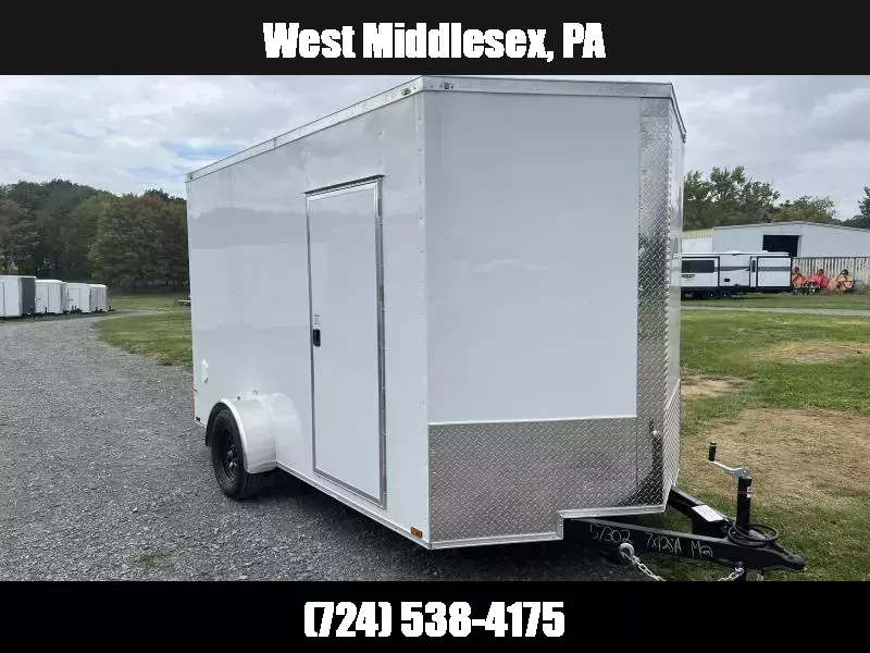 2026 Quality 7x12' Single Axle Enclosed Cargo Trailer 3500# GVW * WHITE .080 POLYCOR EXTERIOR * ELECTRIC BRAKES * 4" FRAME * RAMP DOOR * PLYWOOD WALLS & FLOORS * TUBE WALL AND CEILING STUDS * 16" O.C. WALL AND FLOOR * RV DOOR * V-NOSE 1768017628