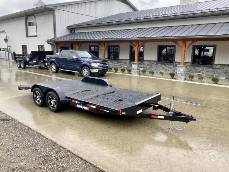 2026 Sure-Trac 7x18' Steel Deck Car Hauler 7000# GVW * 4' BEAVERTAIL * LOW LOAD ANGLE * ALUMINUM WHEELS * 5" TUBE TONGUE/FRAME * AIR DAM * RUBRAIL/STAKE POCKETS/D-RINGS * REMOVABLE FENDER * FULL SEAMS WELDS * REAR SLIDEOUT PUNCH PLATE RAMPS
