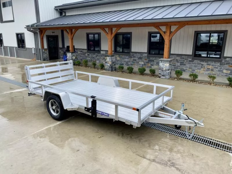 2025 Sure Trac 6x12' Aluminum Utility Landscape Trailer 2990# GVW * EXTRUDED ALUMINUM FLOOR * BI FOLD GATE * ALUMINUM WHEELS * TUBE TOP * TRIPLE TUBE TONGUE * TUBE TONGUE * SWIVEL JACKS * STAKE POCKETS * EXTENDED 54" GATE