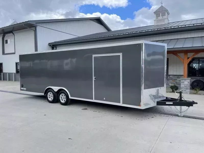 2026 Sure-Trac 8.5x24' Pro Series Enclosed Car Hauler Trailer 9900# GVW * CHARCOAL EXTERIOR * V-NOSE * 5200# AXLES * .030 SCREWLESS EXTERIOR * ALUMINUM WHEELS * 1 PC ROOF * 6" FRAME * 16" O.C. C/M * TUBE STUDS * 48" RV DOOR * 7K DROP JACK