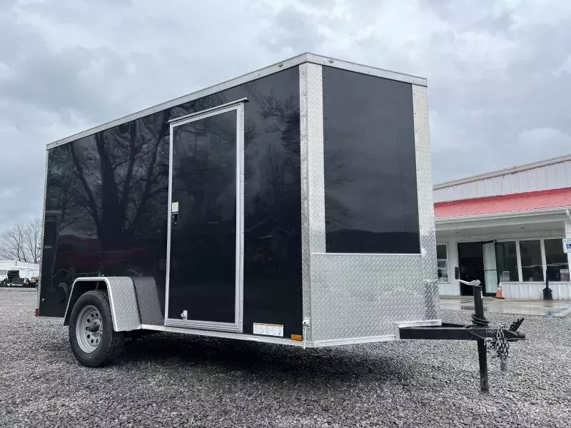 2026 Xtreme Cargo 6x12' Enclosed Cargo Trailer 2990# GVW * 6'3" HEIGHT * 16" FLOOR CROSSMEMBERS * BLACK EXTERIOR * .080 POLYCOR SEMI-SCREWLESS * RV DOOR * PLYWOOD WALLS AND FLOOR * TUBE STUDS