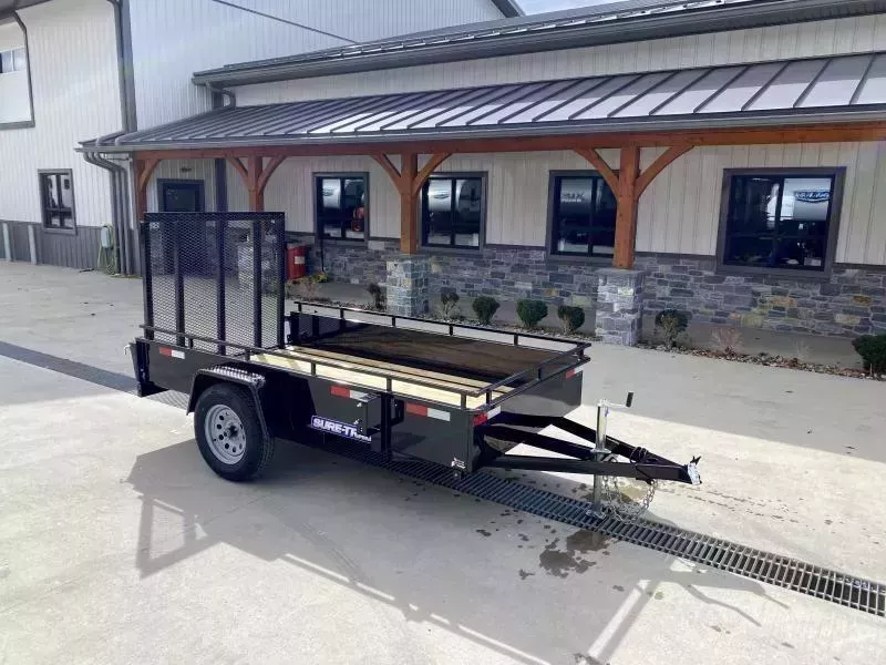 2025 Sure-Trac 5x10' Solid Side Utility Landscape Trailer 2990# GVW * 2X2" TUBE GATE C/M + SPRING ASSIST * FOLD FLAT GATE * TOOLESS GATE REMOVAL * SPARE MOUNT * PROTECTED WIRING * SET BACK JACK * TRIPLE TUBE TONGUE * HD FENDERS * TUBE BUMPER * HIGH SIDE