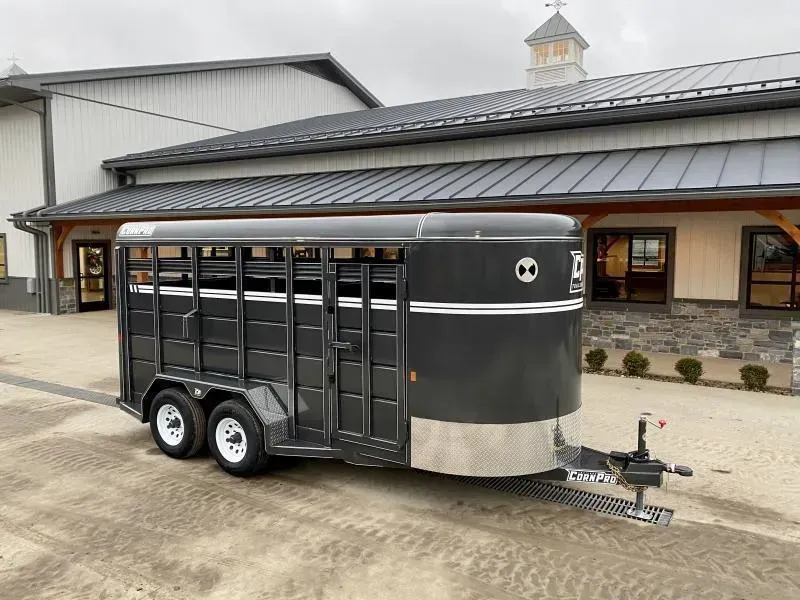 2025 Corn Pro 16' Livestock Trailer 7000# GVW * GREY/CHARCOAL * TORSION SUSPENSION * DEXTER AXLES * 225/75/R15 8-PLY TIRES * HD FENDERS * CENTER AND REAR SLAM GATES * 4" CHANNEL TONGUE * URETHANE PAINT * KILN DRIED LUMBER