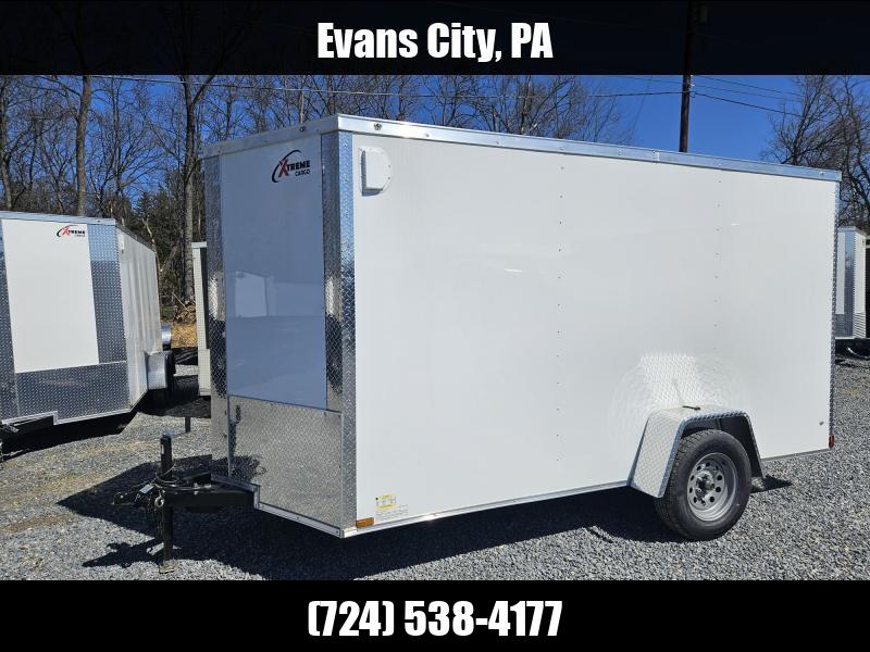 2025 Xtreme Cargo 6x12' Enclosed Cargo Trailer 2990# GVW * ELECTRIC BRAKES * 4 D-RINGS * 6'3" HEIGHT * 16" FLOOR CROSSMEMBERS * WHITE EXTERIOR * .080 POLYCOR SEMI-SCREWLESS * RV DOOR * PLYWOOD WALLS AND FLOOR * TUBE STUDS 1762529275