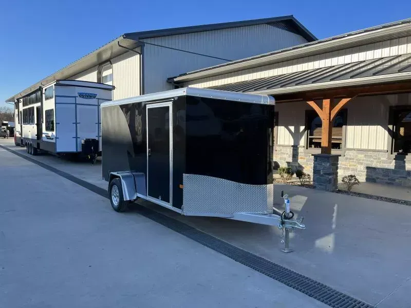 2026 Neo 6x12 NAMR Aluminum Enclosed Motorcycle Trailer Single Axle 2990# GVW * CABLELESS RAMP DOOR * SILVER/CHARCOAL* VINYL WALLS * ALUMINUM WHEELS * SPORT TIE DOWN PACKAGE * CABLELESS RAMP DOOR * NXP DOOR * REAR STABILIZER JACKS