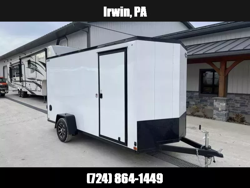 2026 ITI Cargo 6x14' Enclosed Cargo Trailer 2990# GVW * 4" FRAME * 6'6" H * WHITE BLACKOUT EXTERIOR * SCREWLESS .030 EXTERIOR * BLACK ALUMINUM WHEELS * 16" O.C. WALLS * RV DOOR * 1 PC ROOF * TRUCKBED LINER TONGUE & SILLS * UNDERCOATED * VAPOR BARRIER 1768335059