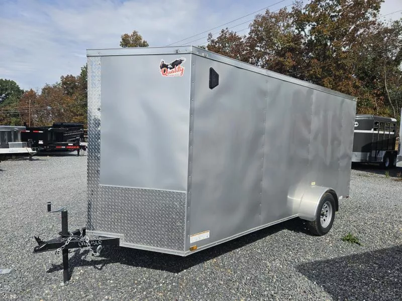 2025 Quality Cargo 6x14' Single Axle Enclosed Cargo Trailer 2990# GVW * 6'3 CEILING HEIGHT * SILVER EXTERIOR * PLYWOOD WALLS AND FLOOR * RV DOOR * 16" O.C. * TUBE STUDS * RAMP DOOR * V-NOSE