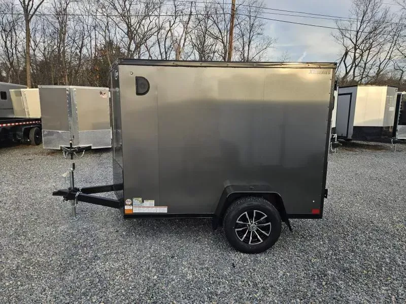 2026 ITI Cargo 5x8' Enclosed Cargo Trailer 2990# GVW * BLACK BLACKOUT EXTERIOR * SCREWLESS .030 EXTERIOR * BLACK ALUMINUM WHEELS * 16" O.C. WALLS * 1 PC ROOF * TRUCKBED LINER ON TONGUE AND SILLS * 4" FRAME * UNDERCOATED * VAPOR BARRIER