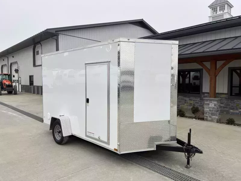 2026 Xtreme Cargo 7x12' Enclosed Cargo Trailer 2990# GVW * 7' HEIGHT - UTV PKG * 16" FLOOR CROSSMEMBERS * WHITE EXTERIOR * .080 POLYCOR SEMI-SCREWLESS * RV DOOR * PLYWOOD WALLS AND FLOOR * TUBE STUDS