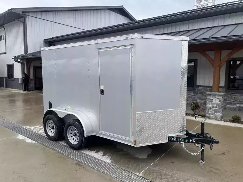 2026 Quality 6x12' Tandem Axle Enclosed Cargo Trailer 7000# GVW * WHITE POLYCOR .080 EXTERIOR * RAMP DOOR * PLYWOOD WALLS & FLOORS * TUBE WALL AND CEILING STUDS * LED LIGHTS * 16" O.C. WALL AND FLOORS * RV DOOR * V-NOSE