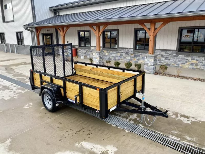 2025 Sure-Trac 6x10' High Side Utility Landscape Trailer 2990# GVW * 24" 3-BOARD HIGH SIDE * 2" TUBE TOP RAIL * 2X2" TUBE GATE C/M + SPRING ASSIST + FOLD FLAT * TOOLESS GATE REMOVAL * SPARE MOUNT * PROTECTED WIRING * SET BACK JACK