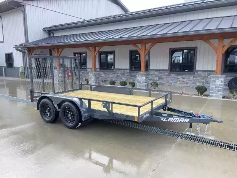 2026 Lamar 7x12' Deluxe Utility Landscape Trailer 7000# GVW * 4" CHANNEL FRAME/TONGUE * CHARCOAL * HD GATE/2X2" TUBE C/M + SPRING ASSIST * COLD WEATHER HARNESS * STAKE POCKETS * TEARDROP FENDERS * BULLET LEDS