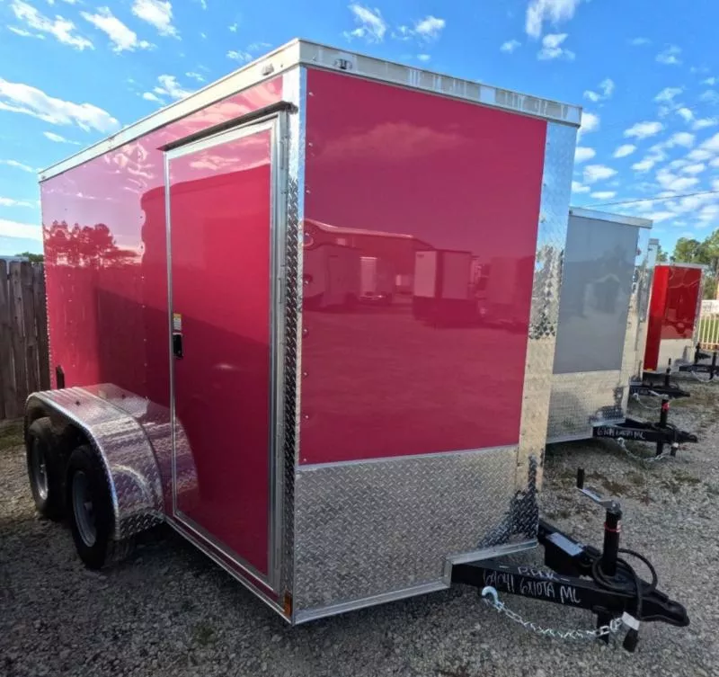 2026 Quality 6x10' Tandem Axle Enclosed Cargo Trailer 7000# GVW * PINK .080 POLYCOR EXTERIOR * RAMP DOOR * SEMI-SCREWLESS * PLYWOOD WALLS & FLOORS * TUBE WALL AND CEILING STUDS * LED LIGHTS * 16" O.C. WALL AND FLOORS * RV DOOR * V-NOSE
