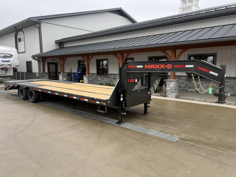 2025 MAXXD 102x32' LDX Gooseneck Flatbed Trailer 25990# GVW * 12000# AXLES * FULL WIDTH RAMPS * 14-PLY LRG TIRES * 19# PIERCED I-BEAM FRAME * WINCH PLATE IN NECK * HDSS SUSPENSION * METALLIC GREY POWDER + PRIMER * 12" O.C. CROSSMEMBERS * 6" SIDE RAIL
