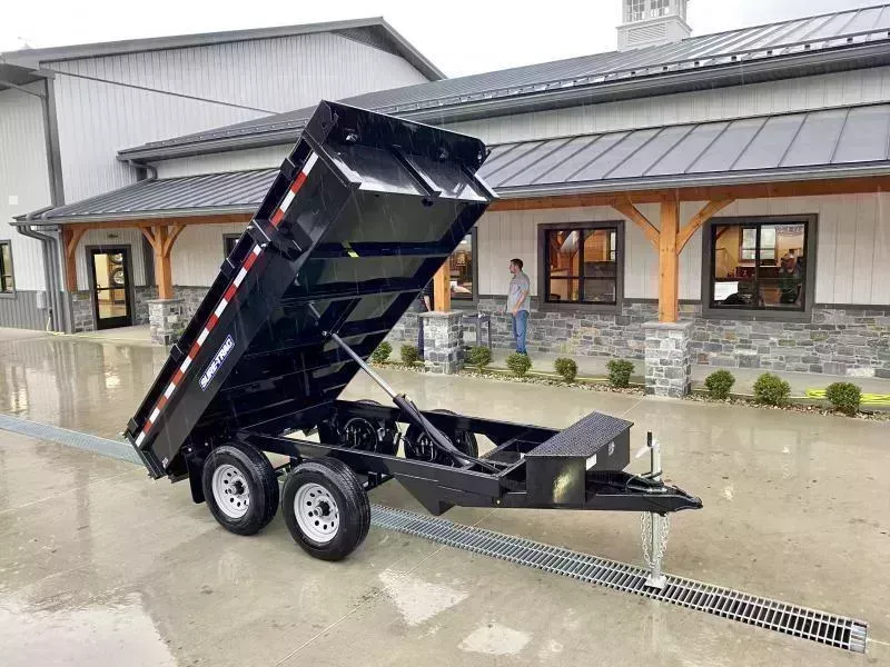 2026 Sure-Trac 6x10' Deckover Dump Trailer 7000# GVW * INTEGRATED KEYWAY * SPARE MOUNT * TARP PREP * D-RINGS * POWER UP/ DOWN * TRIPLE TUBE TONGUE * BULLET LED'S * RADIALS * POWDERCOATED * SEALED HARNESS