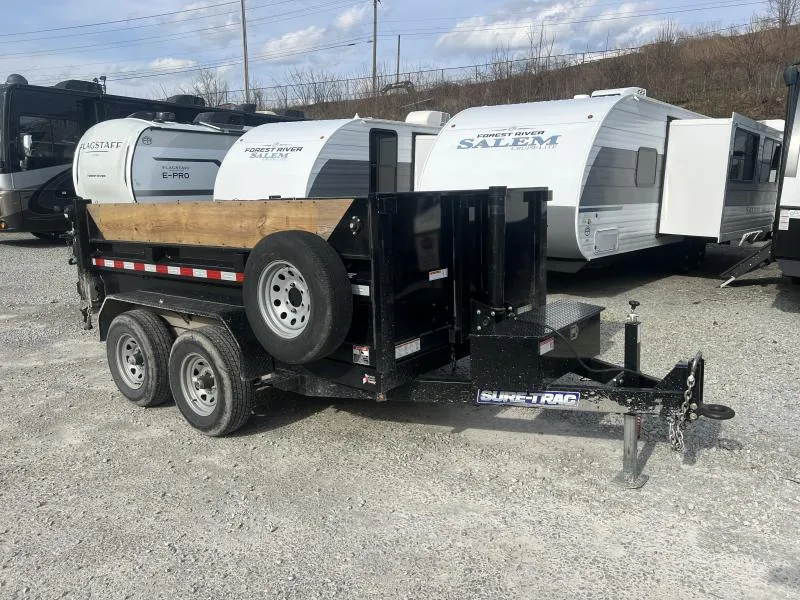 USED 2024 Sure-Trac 6x10' Dump Trailer 9900# GVW * TELESCOPIC HOIST UPGRADE * ADJUSTABLE COUPLER * UNDERMOUNT RAMPS * COMBO GATE * 7K DROP LEG JACK * FRONT/REAR BULKHEAD * INTEGRATED KEYWAY * SPARE MOUNT * HD FENDERS * 4" TUBE BEDFRAME