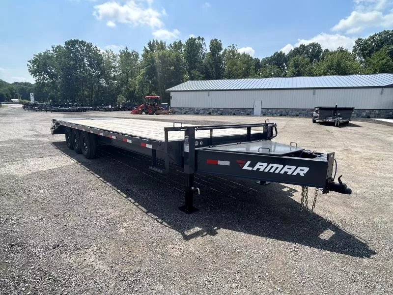 USED 2025 Lamar 102x25' Pintle Beavertail Deckover Trailer 21000# GVW * FULL WIDTH (STAND UP OR FLIPOVER) RAMPS * 12" I-BEAM FRAME * FRONT TOOLBOX * DUAL JACKS * CHARCOAL * 16" O.C. C/M * RUBRAIL/STAKE POCKETS/PIPE SPOOLS