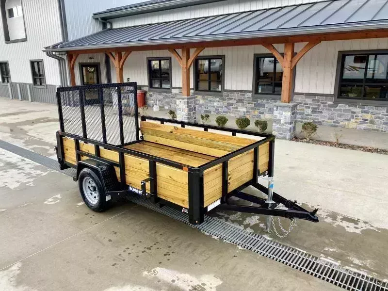 2026 Sure-Trac 6x10' High Side Utility Landscape Trailer 2990# GVW * 24" 3-BOARD HIGH SIDE * 2" TUBE TOP RAIL * 2X2" TUBE GATE C/M + SPRING ASSIST + FOLD FLAT * TOOLESS GATE REMOVAL * SPARE MOUNT * PROTECTED WIRING * SET BACK JACK