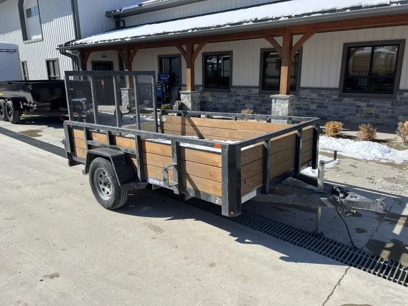 2024 Sure-Trac 6x10' High Side Utility Landscape Trailer 2990# GVW * 24" 3-BOARD HIGH SIDE * 2" TUBE TOP RAIL * 2X2" TUBE GATE C/M + SPRING ASSIST + FOLD FLAT * TOOLESS GATE REMOVAL * SPARE MOUNT * PROTECTED WIRING * SET BACK JACK * TRIPLE TUBE TONGUE 