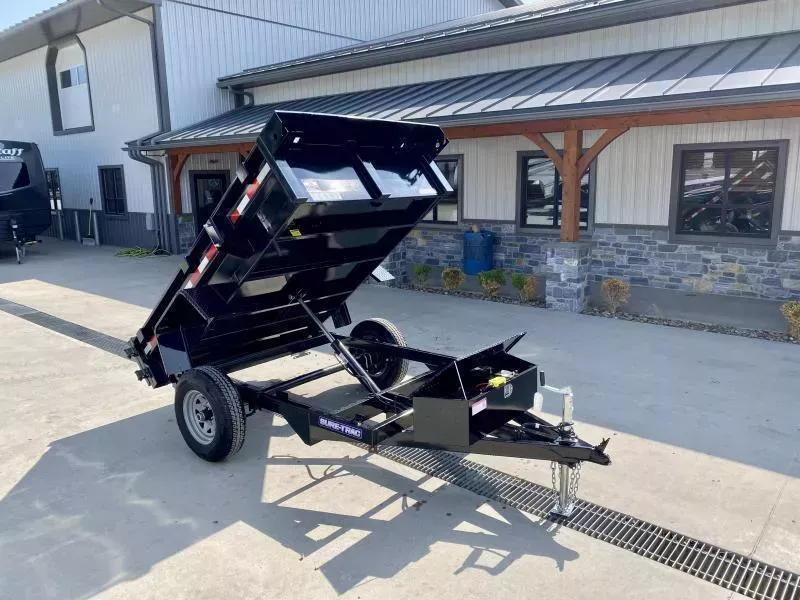 2026 Sure-Trac 5x8' Single Axle Dump Trailer 5000# GVW * BARN DOORS * INTEGRATED KEYWAY * SPARE TIRE MOUNT * TARP PREP * D-RINGS * DIAMOND PLATE FENDERS * POWER UP/POWER DOWN * TRIPLE TUBE TONGUE * BULLET LED'S * RADIALS * POWDERCOATED