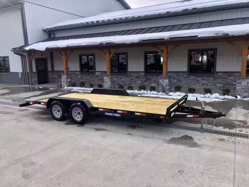 2026 Sure-Trac 7x18 Wood Deck Car Hauler 7000# GVW * REAR SLIDE OUT PUNCH PLATE FINGERJOINTED RAMPS * DIAMOND PLATE FENDERS * SEALED WIRING HARNESS * SET BACK JACK * STAKE POCKETS/D-RINGS * DIAMOND PLATE DOVETAIL