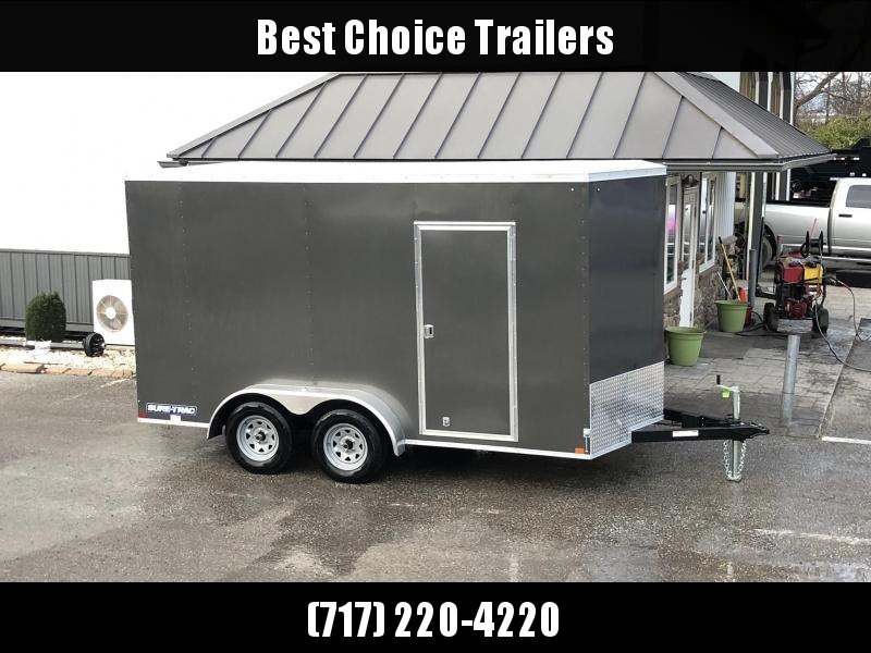 2020 Sure-Trac 7x14' Enclosed Cargo Trailer 7000# GVW * WHITE EXTERIOR * V-NOSE * RAMP * +12" HEIGHT (7') * 4 D-RINGS * HEAVY WALL FRAME * LOADING LIGHT * STABILIZER JACKS * BEAVERTAIL * UTV PACKAGE * .030 SEMI-SCREWLESS EXTERIOR * TUBE STUDS * RV DOOR 2020 Sure-Trac 7x14' Enclosed Cargo Trailer 7000# GVW * WHITE EXTERIOR * V-NOSE * RAMP * +12" HEIGHT (7') * 4 D-RINGS * HEAVY WALL FRAME * LOADING LIGHT * STABILIZER JACKS * BEAVERTAIL * UTV PACKAGE * .030 SEMI-SCREWLESS EXTERIOR * TUBE STUDS * RV DOOR