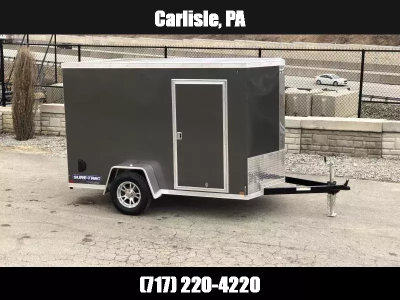 2026 Sure-Trac 6x12' Pro Series Enclosed Cargo Trailer 2990# GVW * CHARCOAL EXTERIOR * V-NOSE * RAMP * .030 SCREWLESS EXTERIOR * ALUMINUM WHEELS * 1 PC ROOF * 4" TUBE FRAME * 16" O.C. WALLS * PLYWOOD * TUBE STUDS * CEILING LINER * RV DOOR 1756952964
